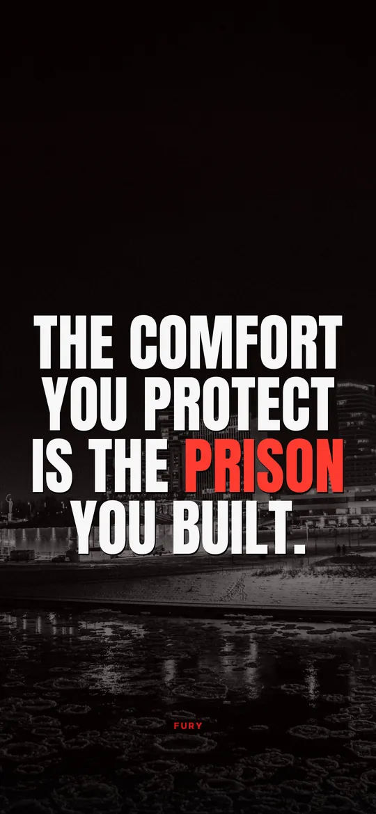 Dark motivational wallpapers: “The comfort you protect is the prison you built.” on black and white city at night