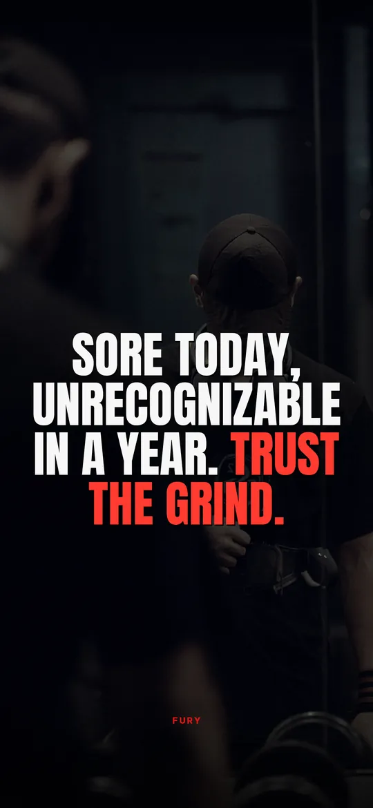 Gym motivation wallpapers: “Sore today, unrecognizable in a year. Trust the grind.” on lifter in a dark gym